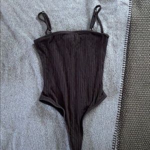 Straight across black body suit